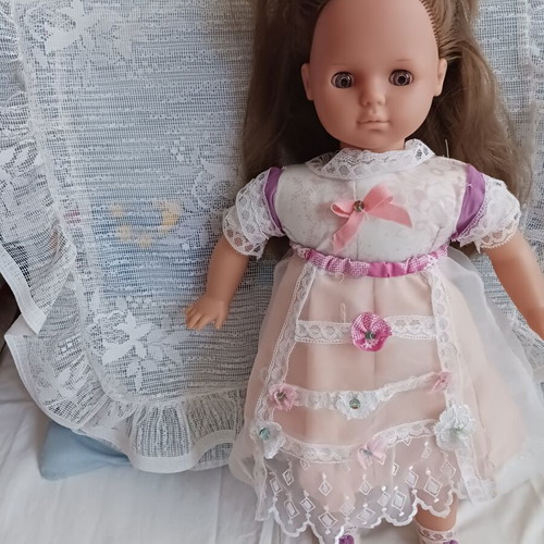 Vintage doll with unique handmade clothes like new