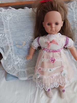 Vintage doll with unique handmade clothes like new
