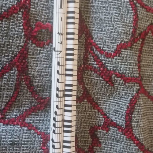 Set of 2 white pencils with piano and music notes design