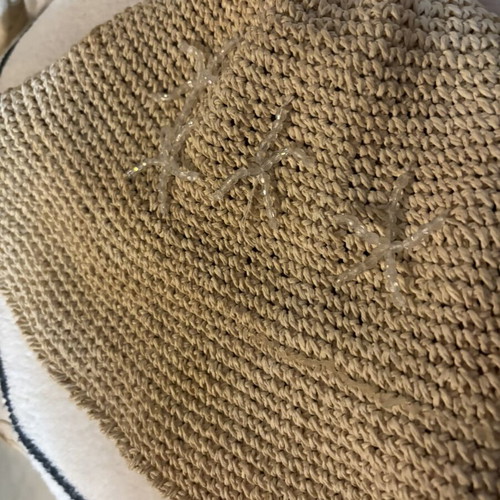 Bucket hat beige straw with embroidered star designs like new