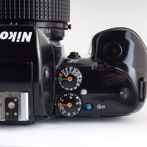 Nikon F-401X 35mm film camera with original leather strap