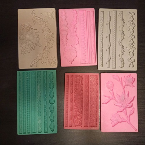Silicone molds like new, 75 pieces for clay and porcelain
