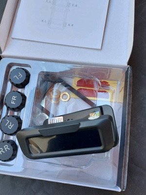 Wireless tire pressure and temperature monitoring system new