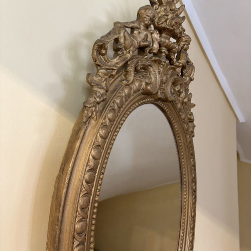 Baroque oval wall mirror with carved plaster frame, used, 104×61 cm