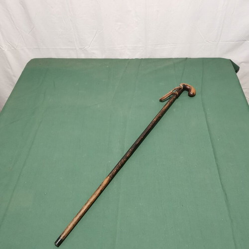 Wooden walking stick used, brown shade with wear
