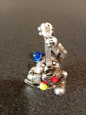 Miniature silver plated guitar like new