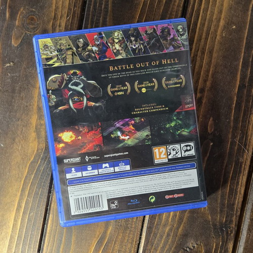 Hades PS4 game with booklet