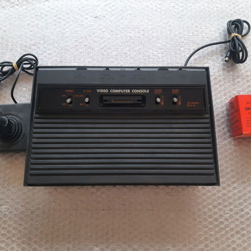 Retro 1990 video game console used with built-in games
