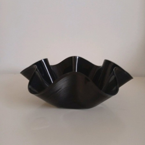 Bowl made from vinyl record used, asymmetrical