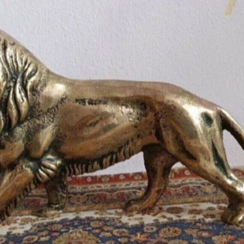 Solid bronze lion sculpture