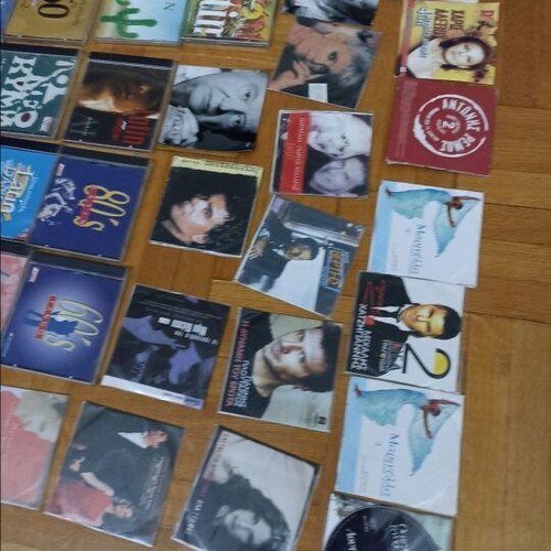43 assorted DVDs with songs and movies