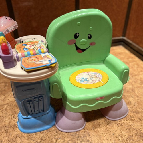 Fisher-Price activity chair used with interactive play table