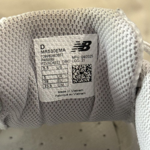 New Balance athletic shoes, size 38, white and silver
