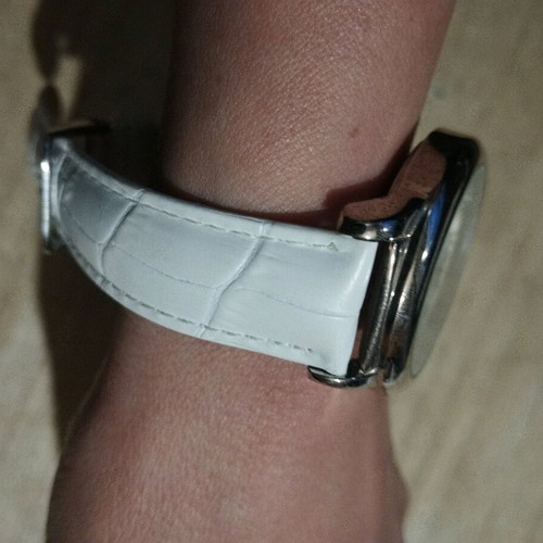 Women's watch used with white leather strap