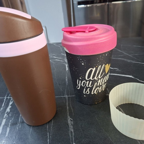 Tupperware and Bamboocup coffee cups used, broken lid on Bamboo cup