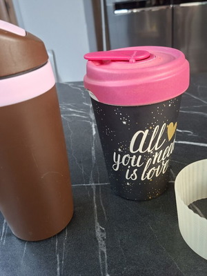Tupperware and Bamboocup coffee cups used, broken lid on Bamboo cup