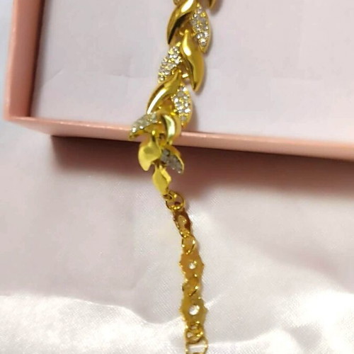 Bracelet shiny with multiple leaves in gold tone new