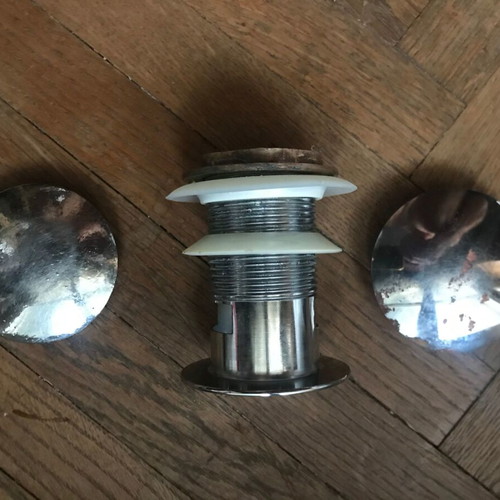 Brass mushroom sink valve used with two caps