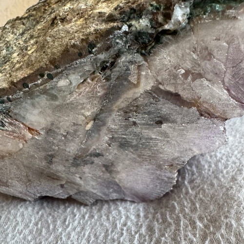 Decorative quartz parrot on raw amethyst base like new