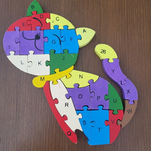 Wooden educational cat puzzle like new with numbers and English letters