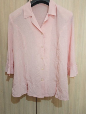 Women's pastel pink shirt like new with bell sleeves and ruffles