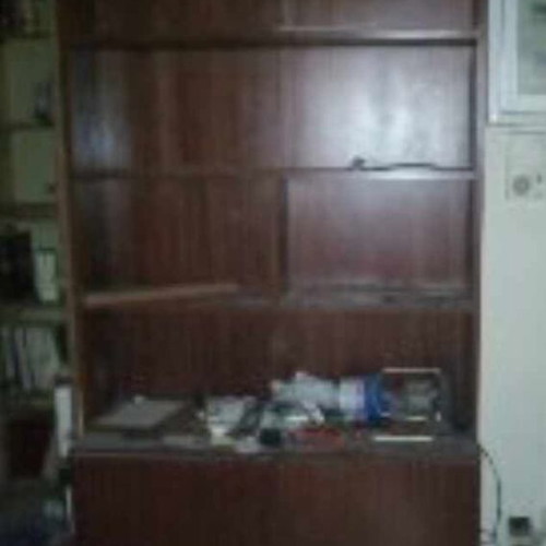 Custom bookcase used with veneer and fixed shelves