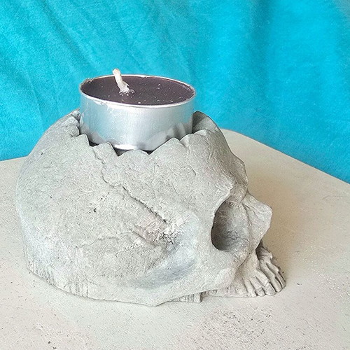 Handmade concrete skull decoration, gothic style