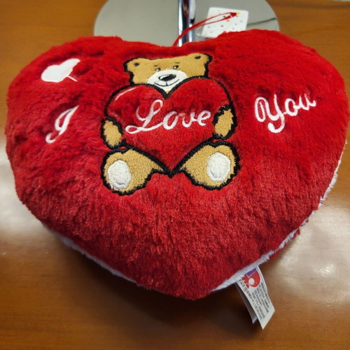 Red plush heart pillow with embroidered teddy bear and message