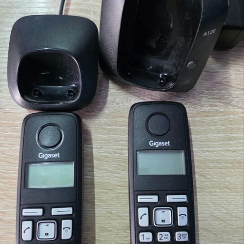 Gigaset A120 cordless phone with 2 handsets like new, black