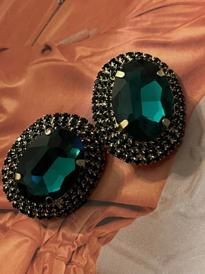 Earrings new with large emerald crystal and sparkling stones