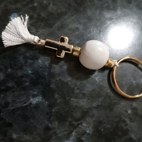 Handmade keychain, with a gold cross, white round wooden bead and white tassel, brand new