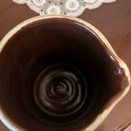 Handmade earthenware jug new with embossed floral pattern