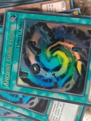 Yu-Gi-Oh Ancient Gear Fusion card like new, ultra rare