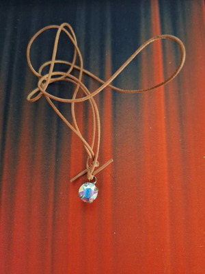Necklace new with brown leather strap and pendant rhinestone