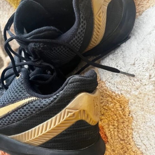 Nike athletic shoes size 42.5 like new, black and gold