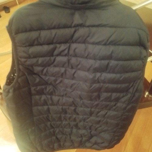 Sleeveless women's vest blue with light padding and polka dot lining, like new