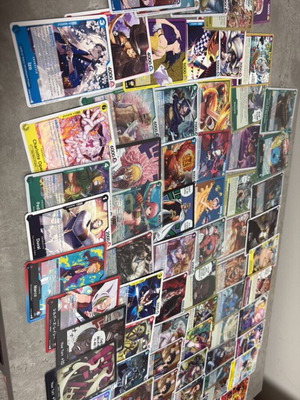 One Piece cards new, set of 74 including Super Rare