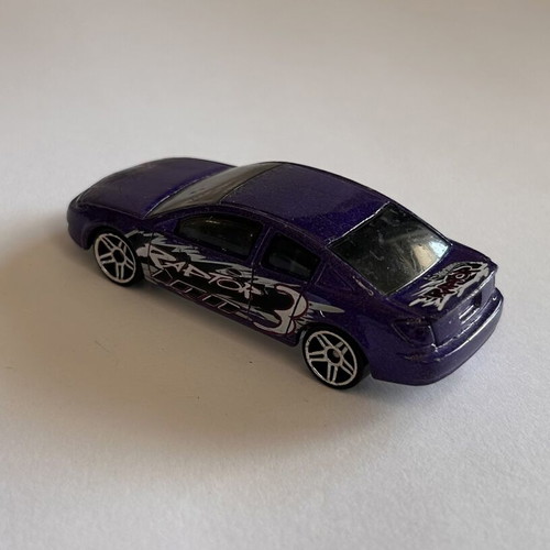 Hot Wheels 2002 Raptor Blast Series Saturn Ion Quad Coupe used