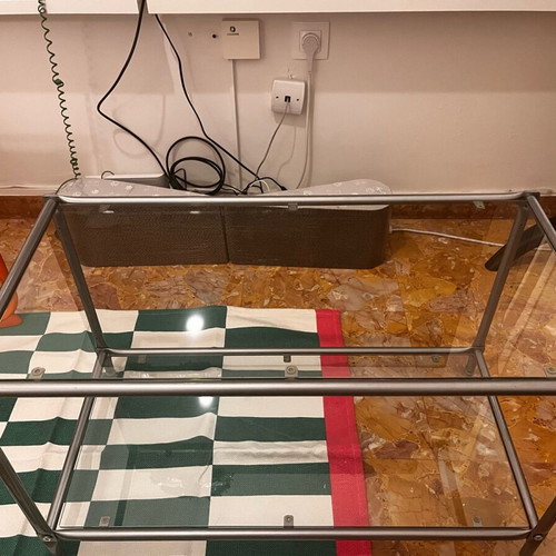 Coffee table used with metal silver frame and glass surface