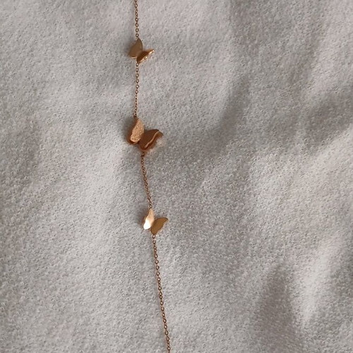 Steel chain bracelet used with 3 butterflies pink gold color
