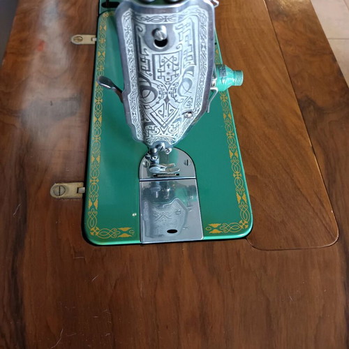 Sigma sewing machine used with wooden cabinet and bar door