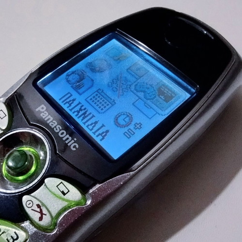 Panasonic EB-GD67 vintage cell phone used, silver, functional with charger