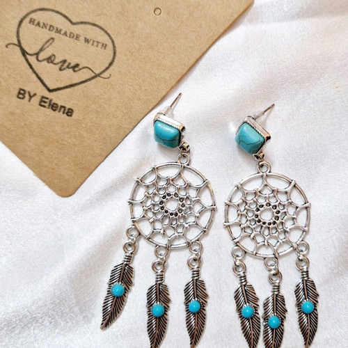 Dreamcatcher earrings new with turquoise stone and silver details