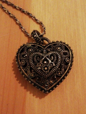Long necklace with antique heart pendant used, gray