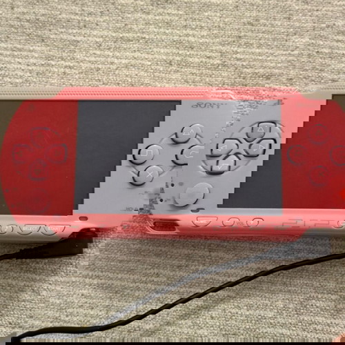 Sony PSP-1004 ροζ σαν καινούργιο με παιχνίδι και φορτιστή