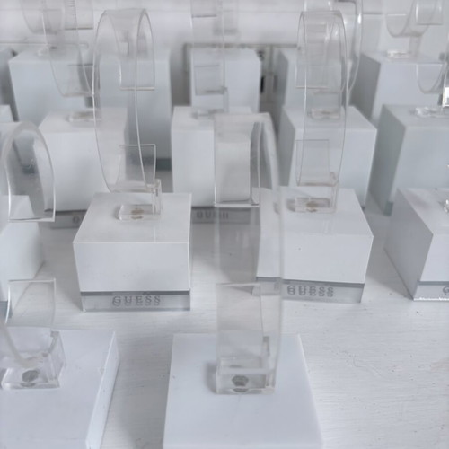 Guess 26 bases for bracelets or watches, like new, display stands set