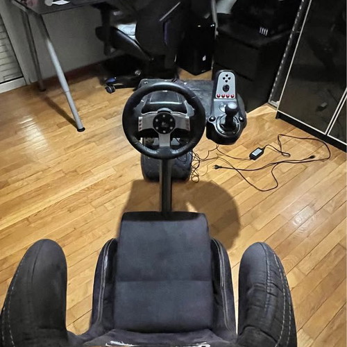 Playseat WRC sim racing seat with Logitech G27 wheel and H-shifter