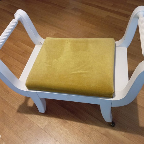 Stool used, missing two legs