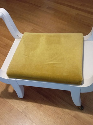 Stool used, missing two legs