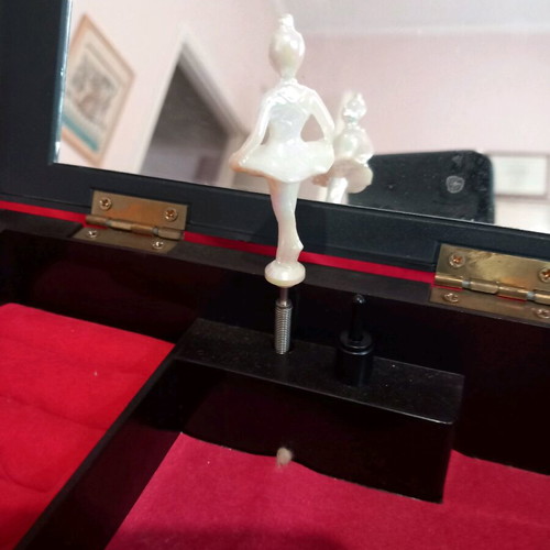 Vintage jewelry music box used with dancing ballerina